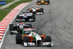 Adrian Sutil, Michael Schumacher, Force India, Ferrari, Malaysia Sunday 2010